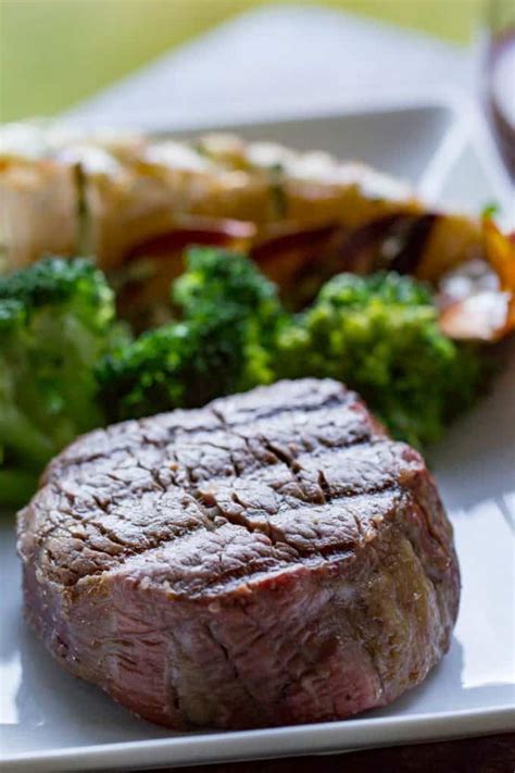 cooking fillet steak on grill
